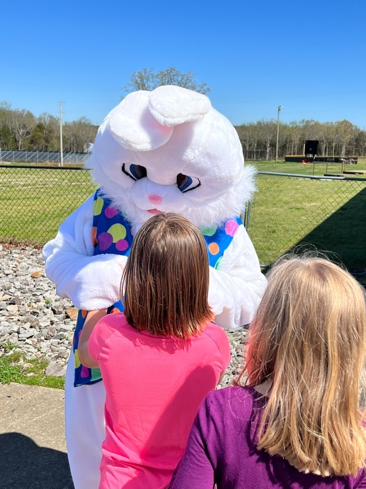 Easter Bunny visiting with students  
